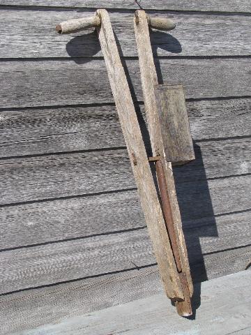 old antique farm tool, hand corn seeder, primitive garden planter