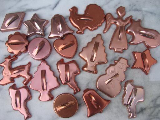 http://www.laurelleaffarm.com/item-photos/retro-70s-vintage-copper-colored-aluminum-cookie-cutters-large-lot-Laurel-Leaf-Farm-item-no-k321129-1.jpg