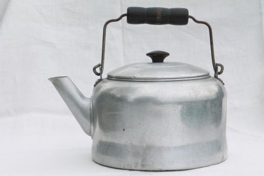 https://www.laurelleaffarm.com/item-photos/big-old-tea-kettle-for-camp-kitchen-vintage-Comet-aluminum-tea-pot-holds-one-gallon-Laurel-Leaf-Farm-item-no-s519129-1.jpg
